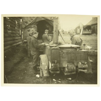 Photo of German field kitchen- Gulaschkanone in russian village, 1941 year. Espenlaub militaria